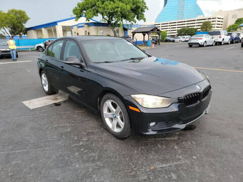2015 BMW 3 Series for sale at THE SHOWROOM in Miami FL