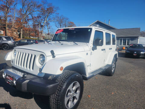 2017 Jeep Wrangler Unlimited for sale at Auto Point Motors, Inc. in Feeding Hills MA