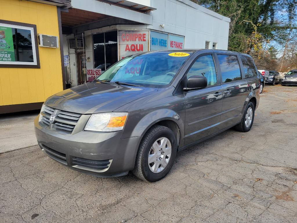 2010 Dodge Grand Caravan for sale at DAGO'S AUTO SALES LLC in Dalton, GA