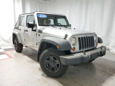 2010 Jeep Wrangler Unlimited for sale at Tradewind Car Co in Muskegon MI