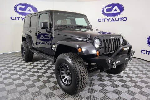 2011 Jeep Wrangler Unlimited for sale at NEXT AUTO, INC. in Murfreesboro TN