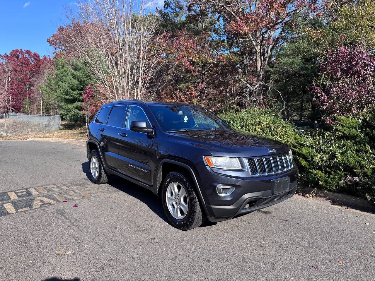 2014 Jeep Grand Cherokee for sale at Paragon Auto Group in Toms River, NJ