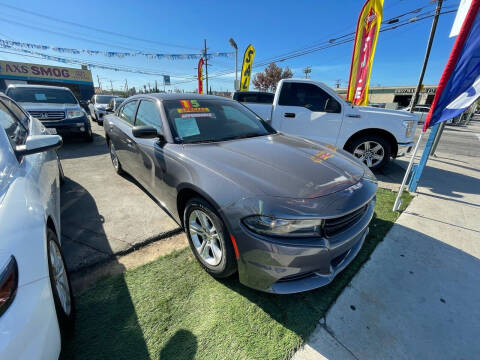 2015 Dodge Charger for sale at ROMO'S AUTO SALES in Los Angeles CA