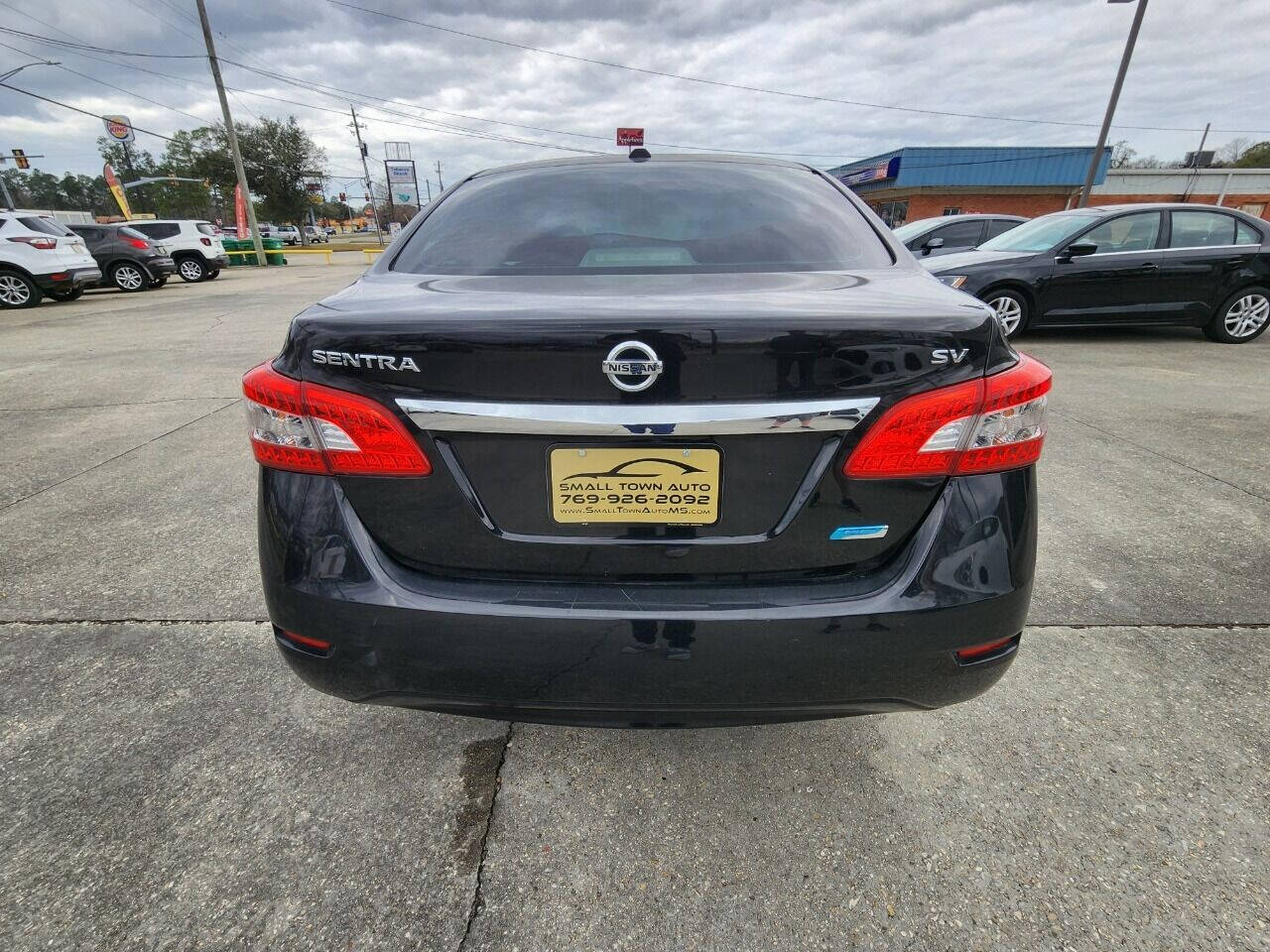 2013 Nissan Sentra for sale at Small Town Auto in Picayune, MS