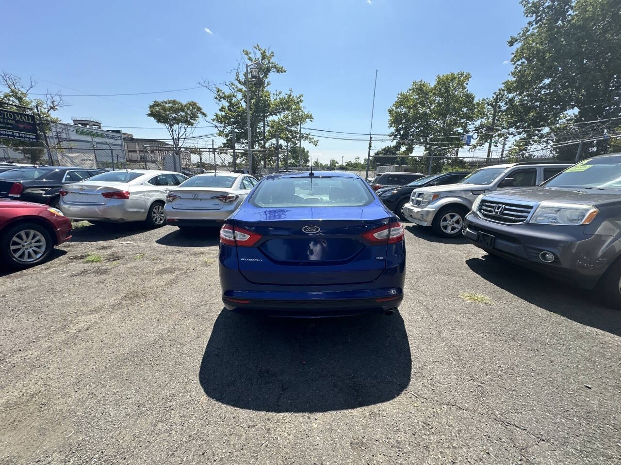 2014 Ford Fusion for sale at 77 Auto Mall in Newark, NJ