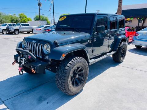 2016 Jeep Wrangler Unlimited for sale at A AND A AUTO SALES - Yuma Location in Yuma AZ