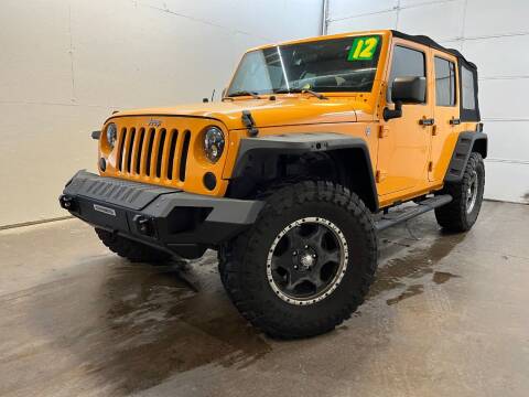 2012 Jeep Wrangler Unlimited for sale at Frogs Auto Sales in Clinton IA