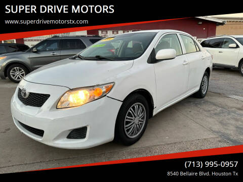 2009 Toyota Corolla for sale at SUPER DRIVE MOTORS in Houston TX