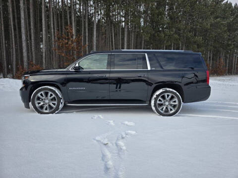 2016 Chevrolet Suburban for sale at McLain's Auto Sales in Lake City MI