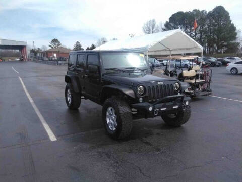 2015 Jeep Wrangler Unlimited for sale at Auto Solutions in Maryville TN