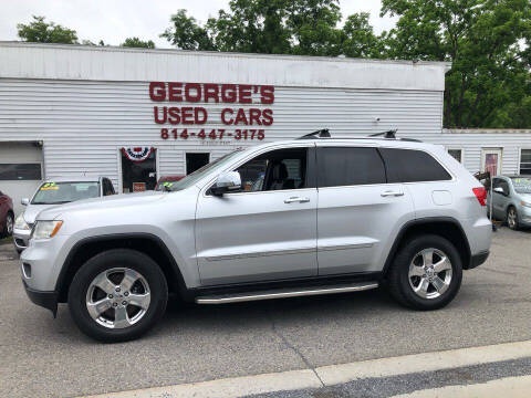 2011 Jeep Grand Cherokee for sale at George's Used Cars Inc in Orbisonia PA