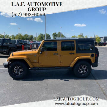 2014 Jeep Wrangler Unlimited for sale at L.A.F. Automotive Group in Lansing MI