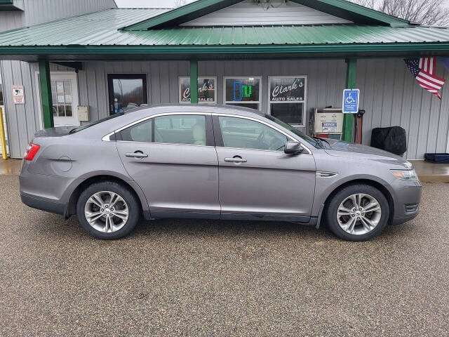 2014 Ford Taurus for sale at Clarks Auto Sales Inc in Lakeview, MI