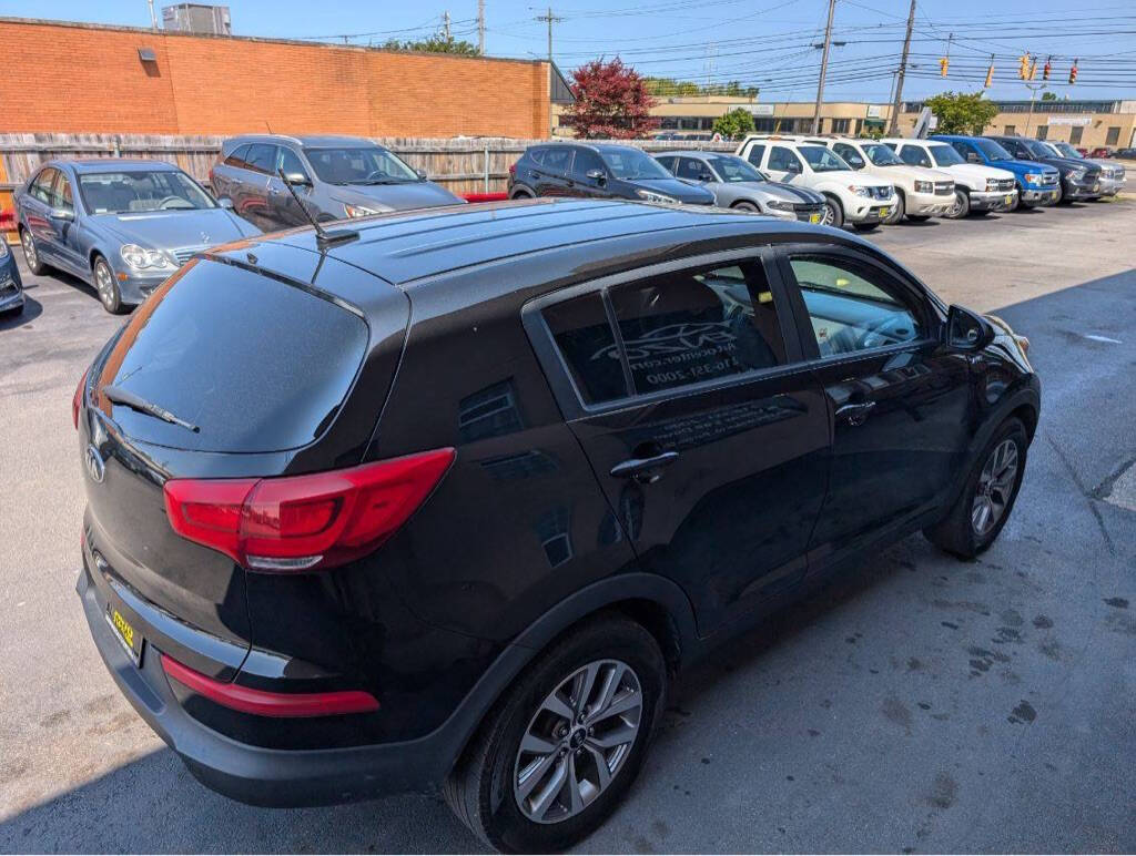 2014 Kia Sportage for sale at ENZO AUTO in Parma, OH