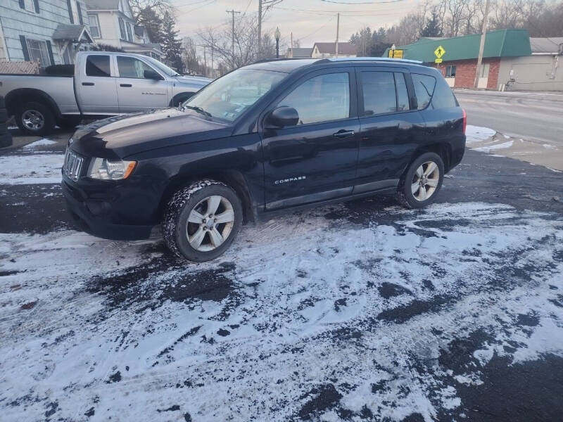 2011 Jeep Compass for sale at Maximum Auto Group II INC in Cortland OH