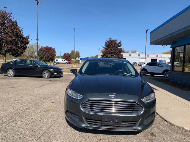 2016 Ford Fusion for sale at Cars On Demand LLC in Lansing, MI