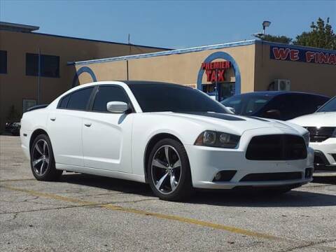 2013 Dodge Charger for sale at Sunny Florida Cars in Bradenton FL