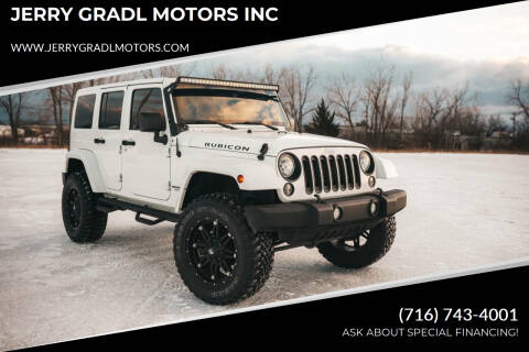 2014 Jeep Wrangler Unlimited for sale at JERRY GRADL MOTORS INC in North Tonawanda NY