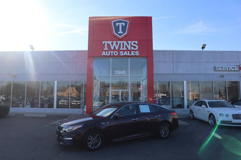 twins auto sales fight