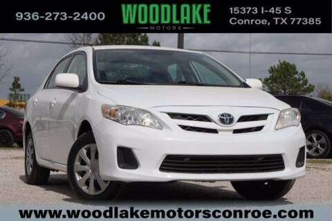2011 Toyota Corolla for sale at WOODLAKE MOTORS in Conroe TX