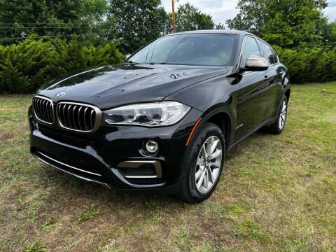 2017 BMW X6 for sale at PUTNAM AUTO SALES INC in Marietta OH