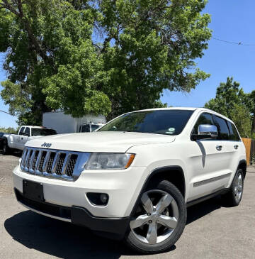 2012 Jeep Grand Cherokee for sale at Unlimited Motors, LLC in Denver CO