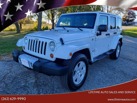 2011 Jeep Wrangler Unlimited for sale at Lifetime Auto Sales and Service in West Bend WI