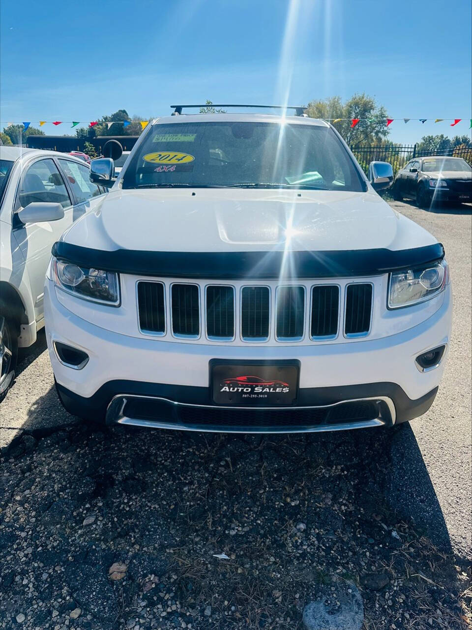 2014 Jeep Grand Cherokee for sale at Los Arreglados Auto Sales in Worthington, MN