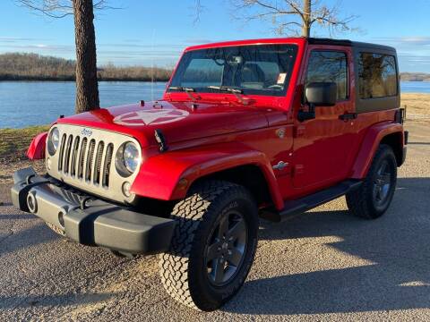 2015 Jeep Wrangler for sale at Monroe Auto's, LLC in Parsons TN