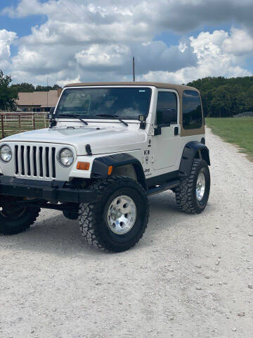 2003 Jeep Wrangler for sale at Andover Auto Group, LLC. in Argyle TX