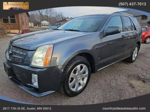 2009 Cadillac SRX for sale at COUNTRYSIDE AUTO INC in Austin MN