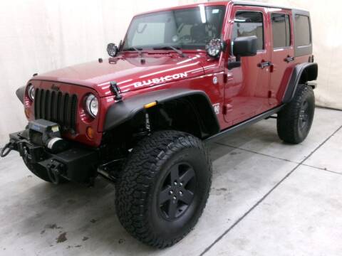 2012 Jeep Wrangler Unlimited for sale at Paquet Auto Sales in Madison OH
