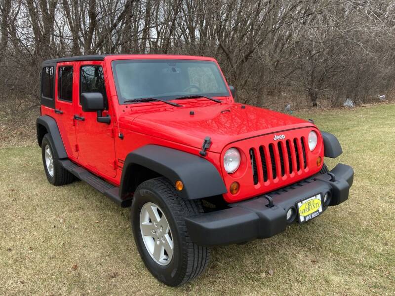 2013 Jeep Wrangler Unlimited for sale at M & M Motors in West Allis WI