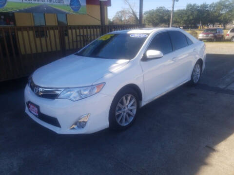 2014 Toyota Camry for sale at Taylor Trading Co in Beaumont TX