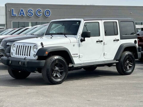 2017 Jeep Wrangler Unlimited for sale at LASCO FORD in Fenton MI
