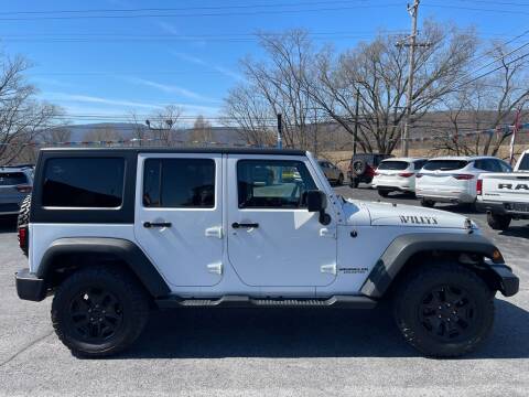 2017 Jeep Wrangler Unlimited for sale at MAGNUM MOTORS in Reedsville PA