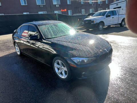 2013 BMW 3 Series for sale at McManus Motors in Wheat Ridge CO