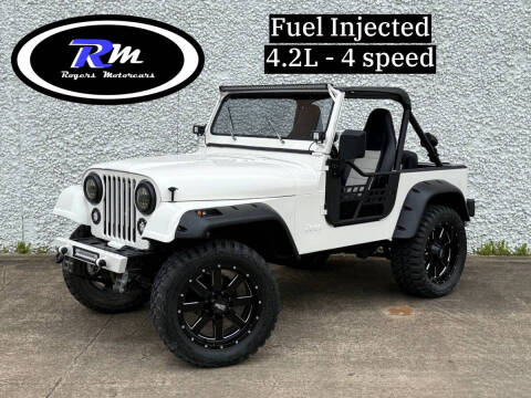1984 Jeep CJ-7 for sale at ROGERS MOTORCARS in Houston TX