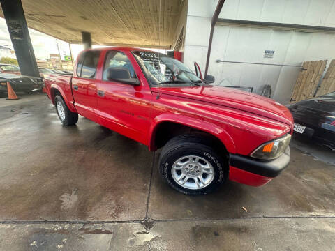 2002 Dodge Dakota for sale at Buy-Fast Autos in Houston TX