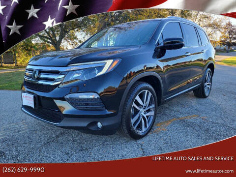 2018 Honda Pilot for sale at Lifetime Auto Sales and Service in West Bend WI