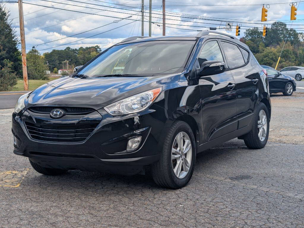 2013 Hyundai TUCSON for sale at Hopedale Auto Sales in Burlington, NC