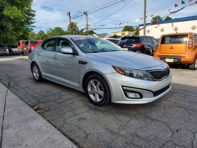 2014 Kia Optima for sale at DAGO'S AUTO SALES LLC in Dalton, GA