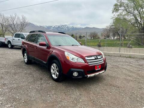 2013 Subaru Outback for sale at The Car-Mart in Bountiful UT