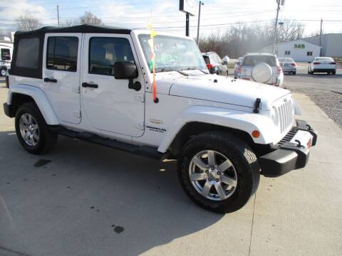 2013 Jeep Wrangler Unlimited for sale at Schrader - Used Cars in Mount Pleasant IA