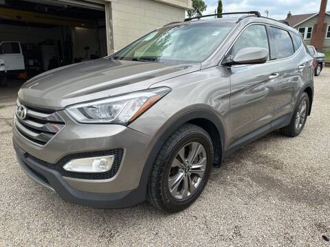 2015 Hyundai Santa Fe Sport for sale at TIM'S AUTO SOURCING LIMITED in Tallmadge OH