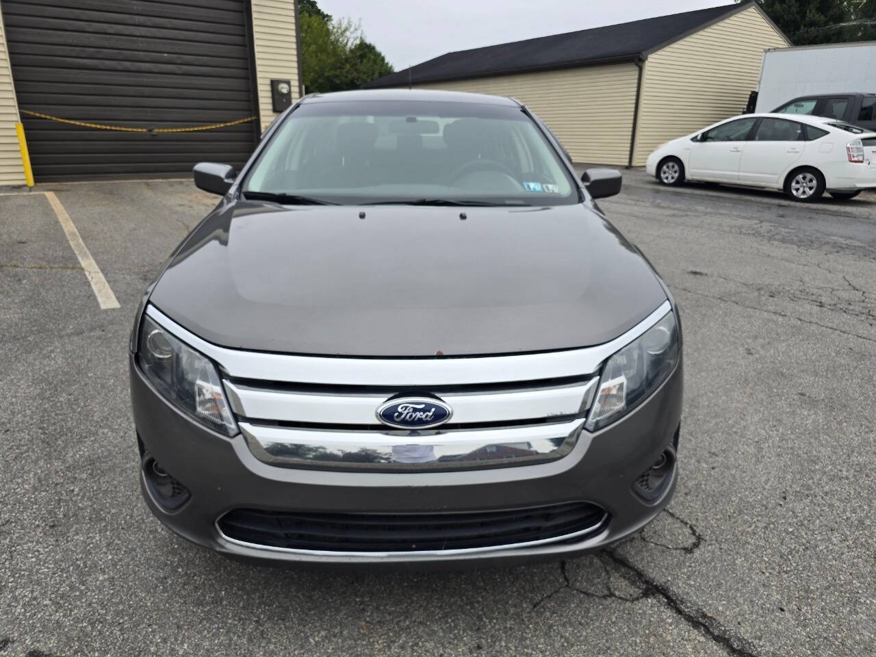 2011 Ford Fusion for sale at QUEENSGATE AUTO SALES in York, PA