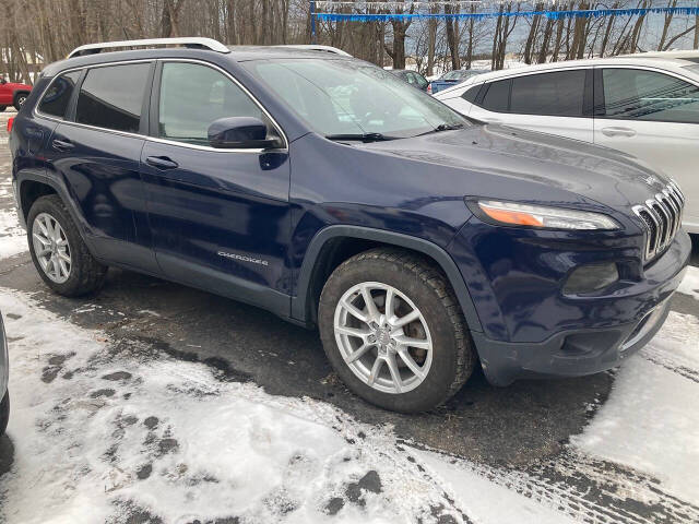 2014 Jeep Cherokee for sale at Chuckie Bizzarro's Fleetwing Auto in Erie, PA