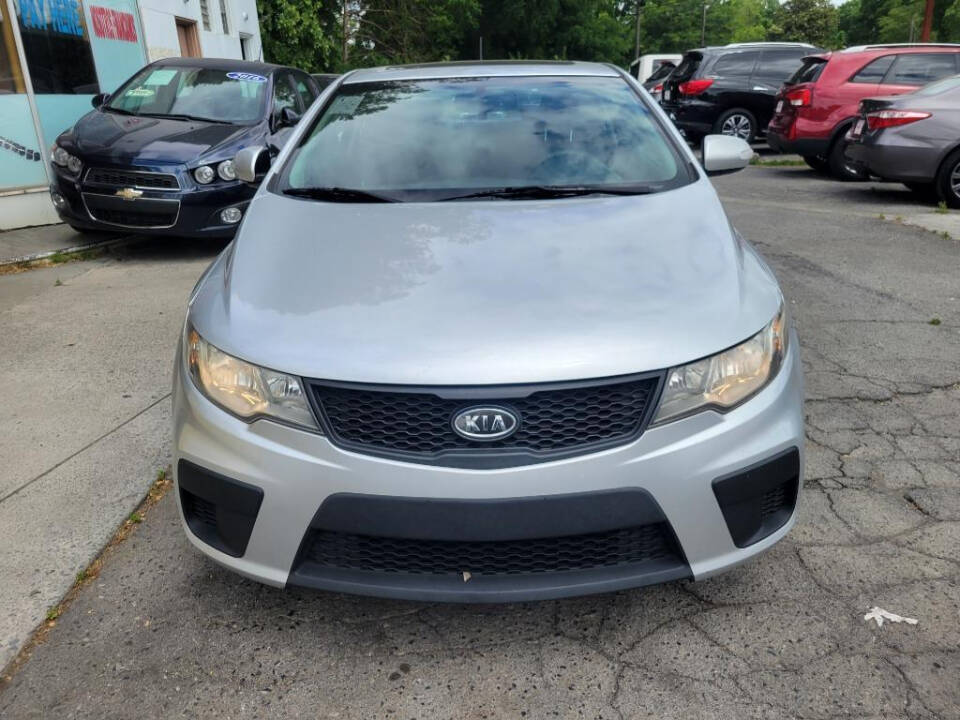 2010 Kia Forte Koup for sale at DAGO'S AUTO SALES LLC in Dalton, GA