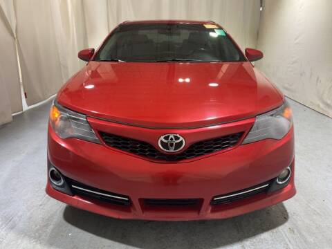 2012 Toyota Camry for sale at Dealmakers Auto Sales in Lithia Springs GA