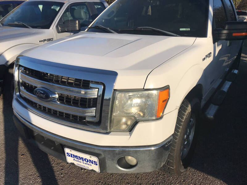 2014 Ford F-150 for sale at Simmons Auto Sales in Denison TX